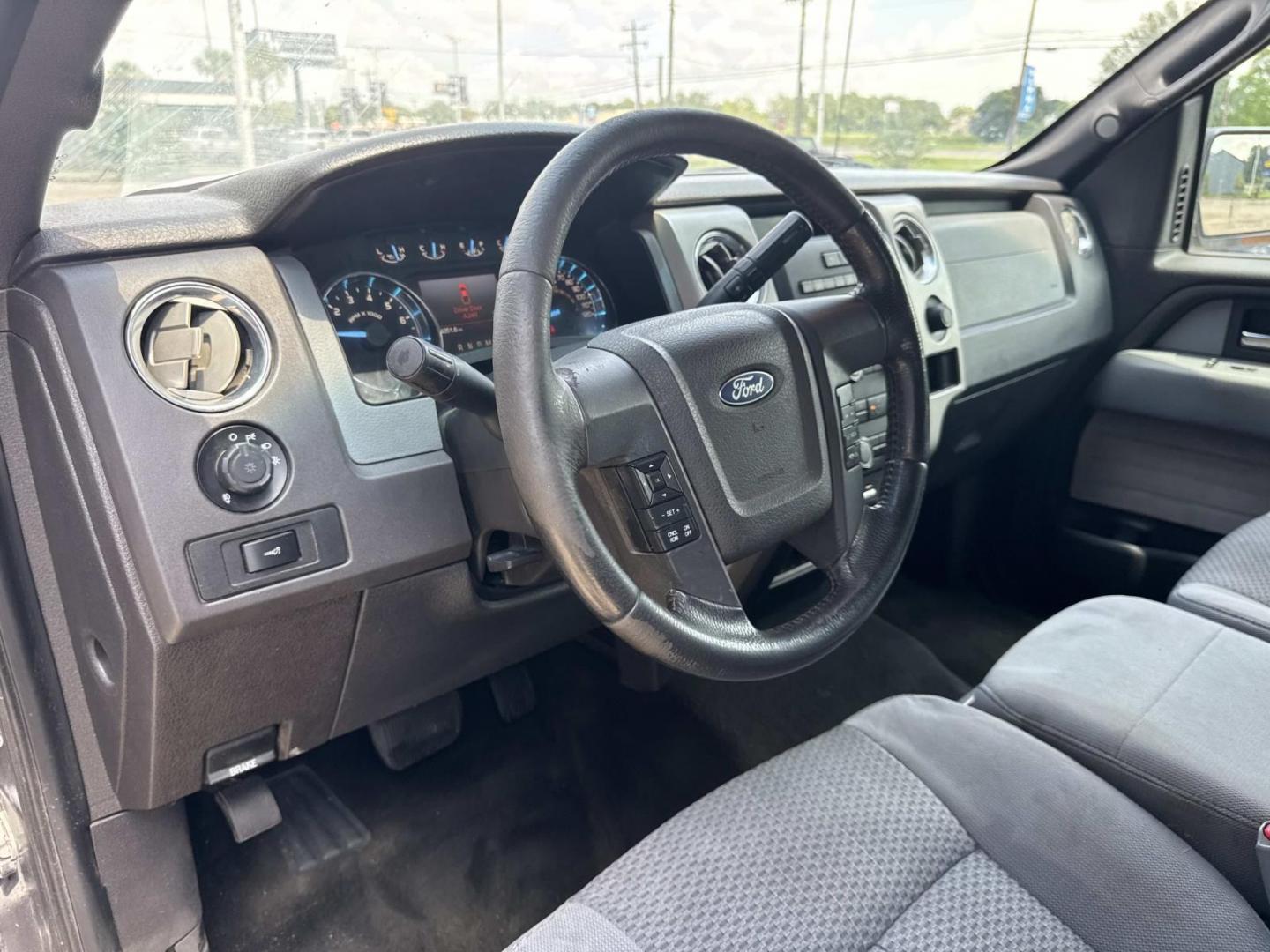 2012 Gray /Steel Gray Ford F-150 2WD SuperCrew 145 XL (1FTEW1CM3CF) , Automatic transmission, located at 6904 Johnston St., Lafayette, LA, 70503, (337) 988-1960, 30.143589, -92.100601- Photo#16