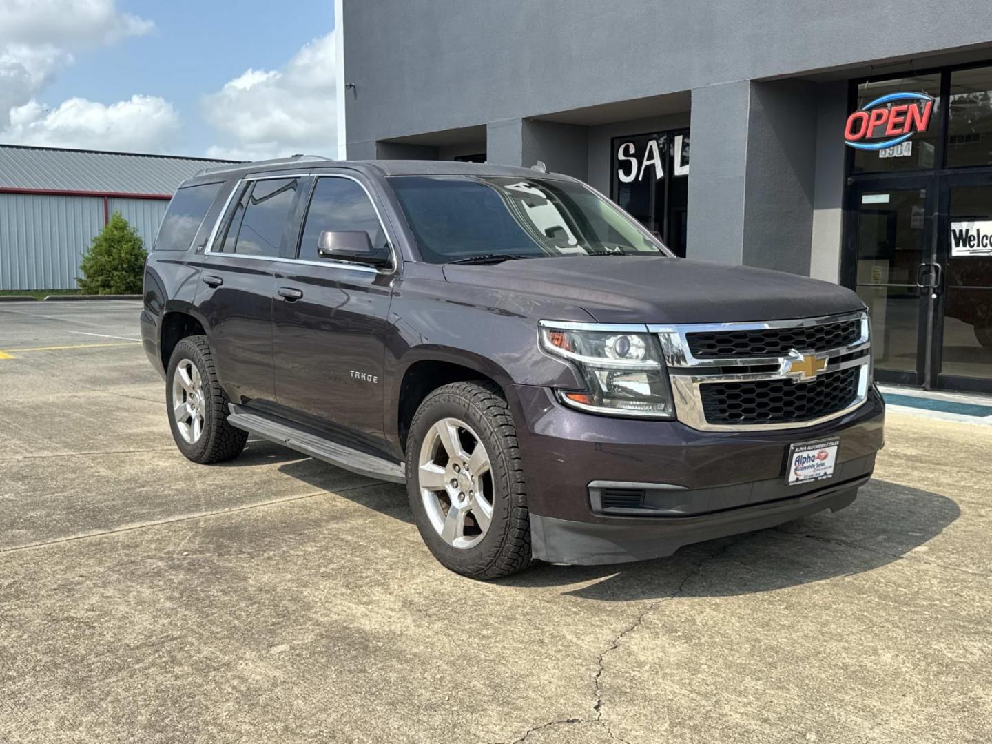 2015 Brown /Tan Chevrolet Tahoe 4WD 4dr LT (1GNSKBKC7FR) , Automatic transmission, located at 6904 Johnston St., Lafayette, LA, 70503, (337) 988-1960, 30.143589, -92.100601- Photo#1