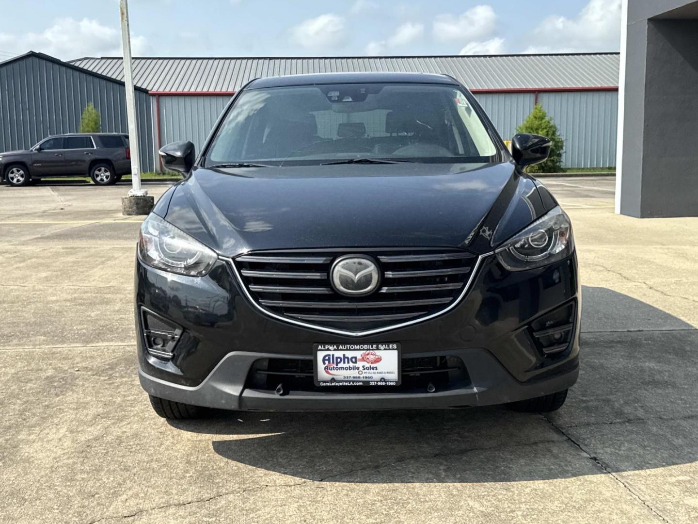 2016 Black /Black Mazda CX-5 FWD 4dr Auto Grand Touring (JM3KE2DY7G0) , Automatic transmission, located at 6904 Johnston St., Lafayette, LA, 70503, (337) 988-1960, 30.143589, -92.100601- Photo#2