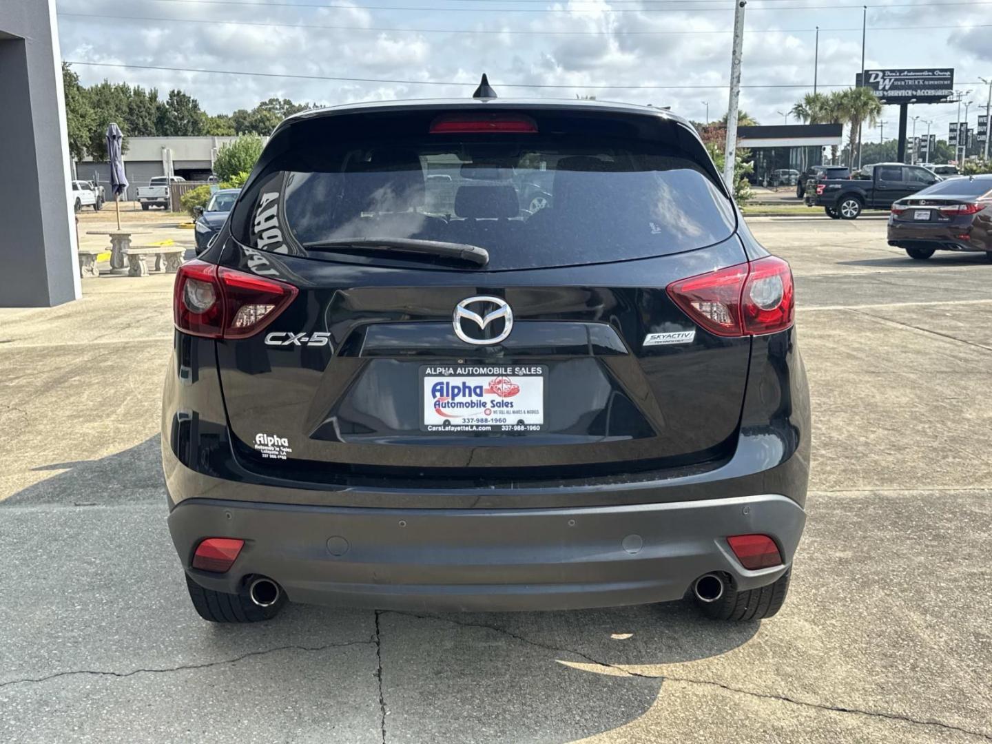 2016 Black /Black Mazda CX-5 FWD 4dr Auto Grand Touring (JM3KE2DY7G0) , Automatic transmission, located at 6904 Johnston St., Lafayette, LA, 70503, (337) 988-1960, 30.143589, -92.100601- Photo#6