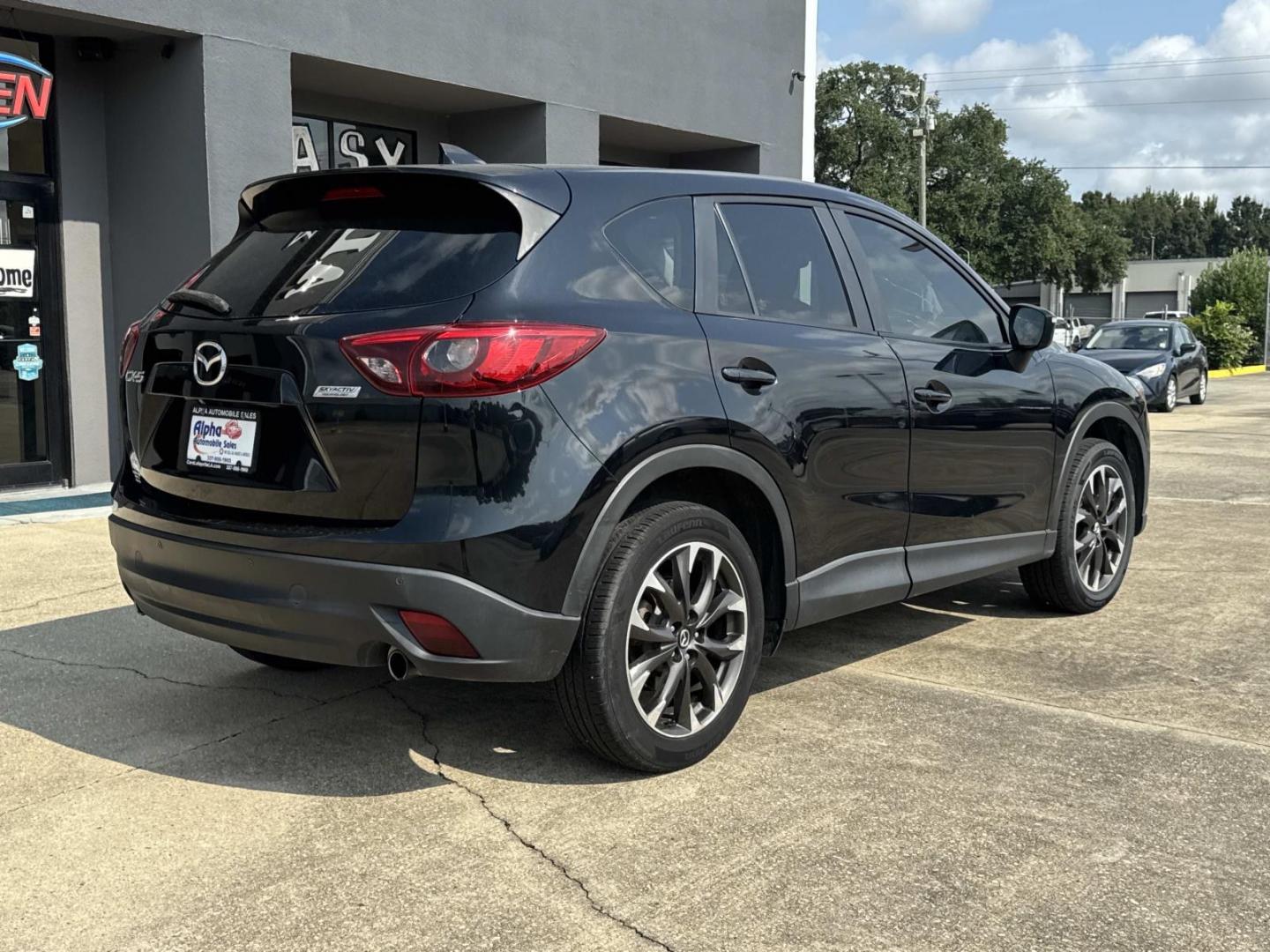 2016 Black /Black Mazda CX-5 FWD 4dr Auto Grand Touring (JM3KE2DY7G0) , Automatic transmission, located at 6904 Johnston St., Lafayette, LA, 70503, (337) 988-1960, 30.143589, -92.100601- Photo#7