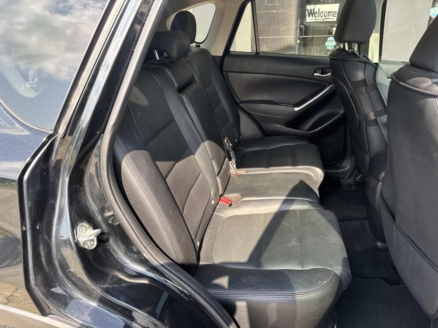 2016 Black /Black Mazda CX-5 FWD 4dr Auto Grand Touring (JM3KE2DY7G0) , Automatic transmission, located at 6904 Johnston St., Lafayette, LA, 70503, (337) 988-1960, 30.143589, -92.100601- Photo#9